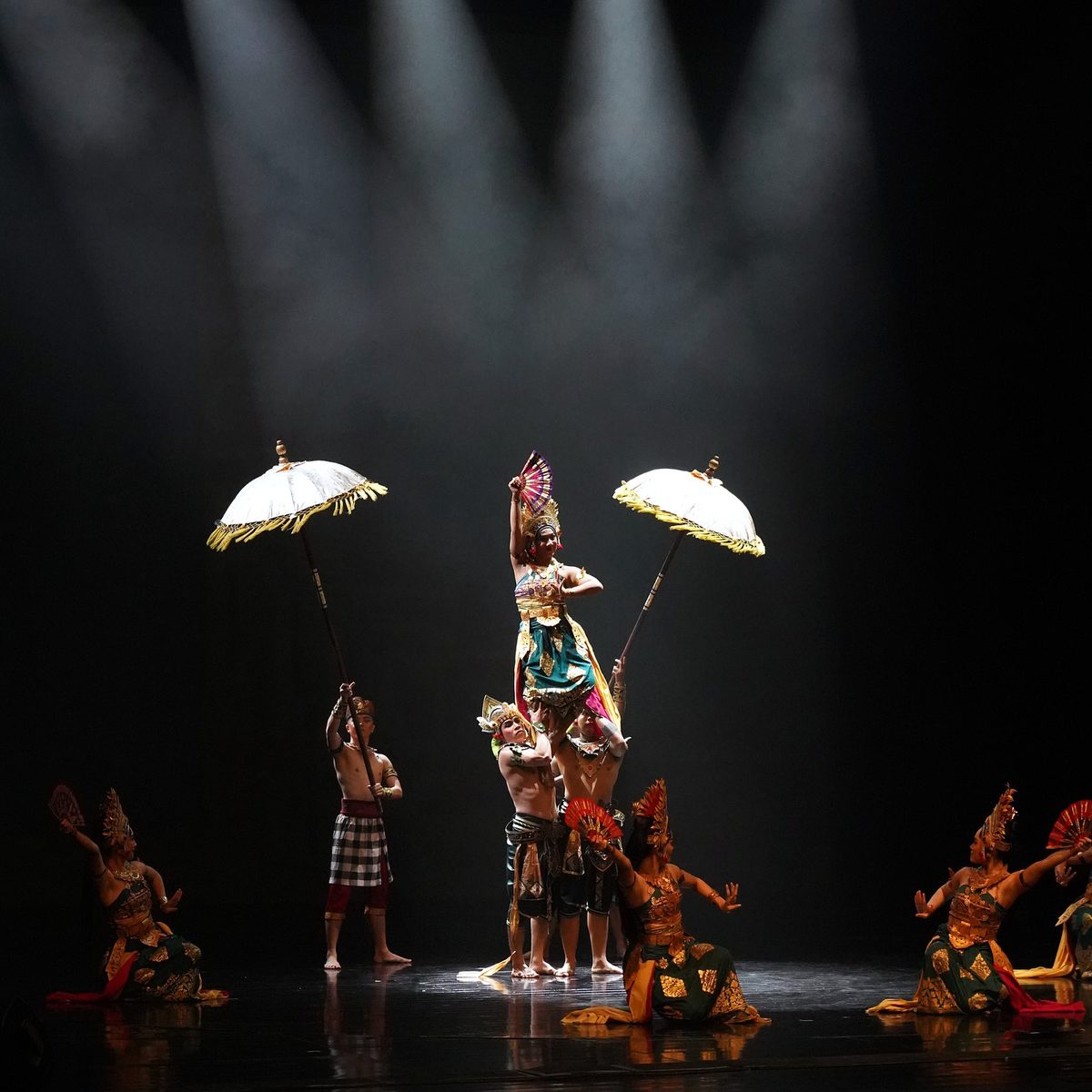 Two acrobats performing an aerial straps number